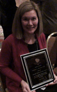 Jeanne-with-Award-rev